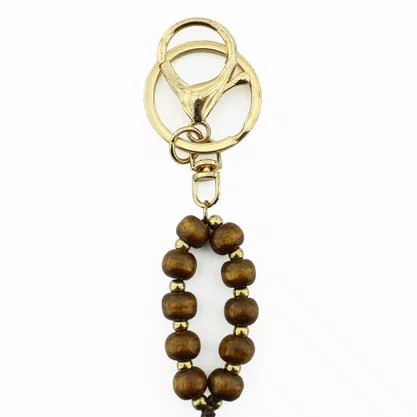 Chaveiro de Madeira São Cristóvão Imbuia Mosquete Dourado