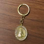 Chaveiro de Nossa Aparecida Oval Dourado Strass