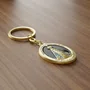 Chaveiro de Nossa Senhora Aparecida Oval Dourado Fundo Preto